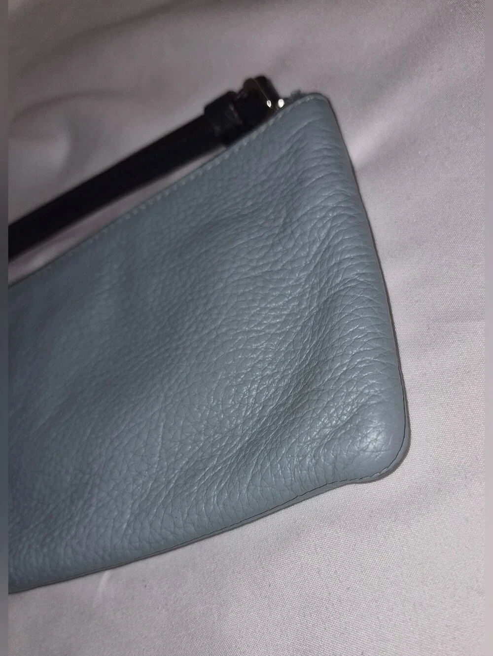 Coach corner zip